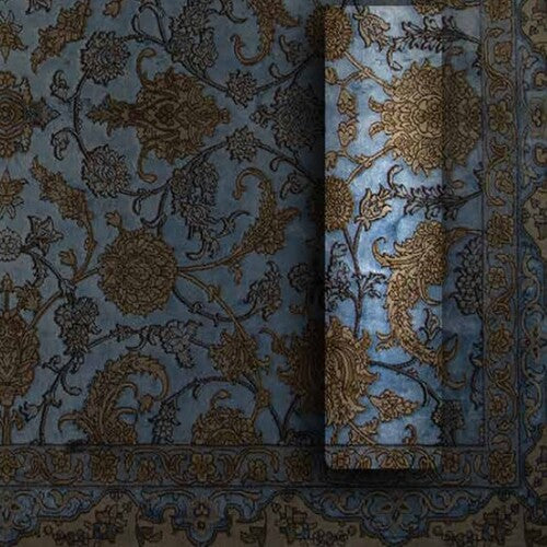 An image of the In-Stock Poet Collection is shown. The rugs are made of durable polyester and are available for purchase. This exclusive collection boasts a variety of designs and sizes to suit any home décor.